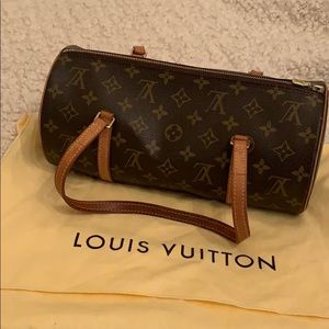 Louis Vuitton roll bag